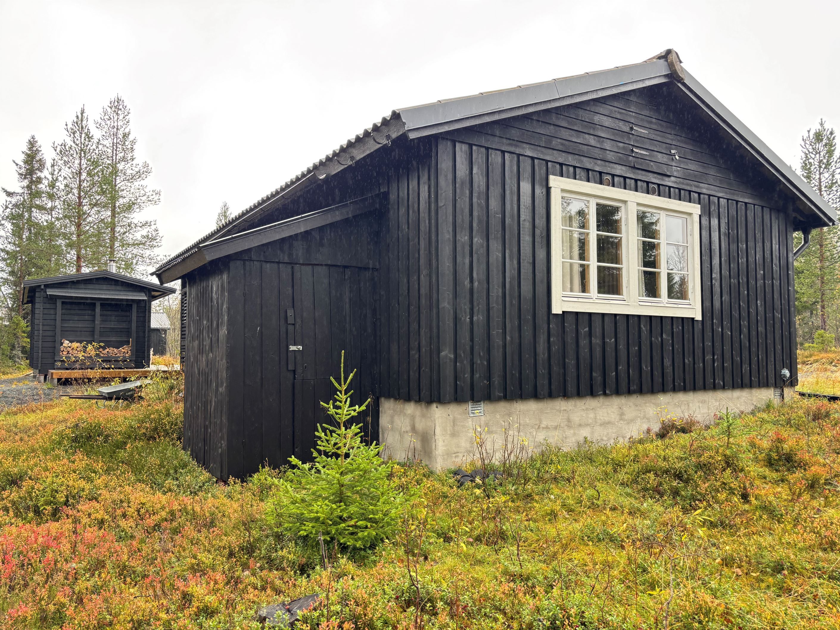 Förråd på baksidan av huset