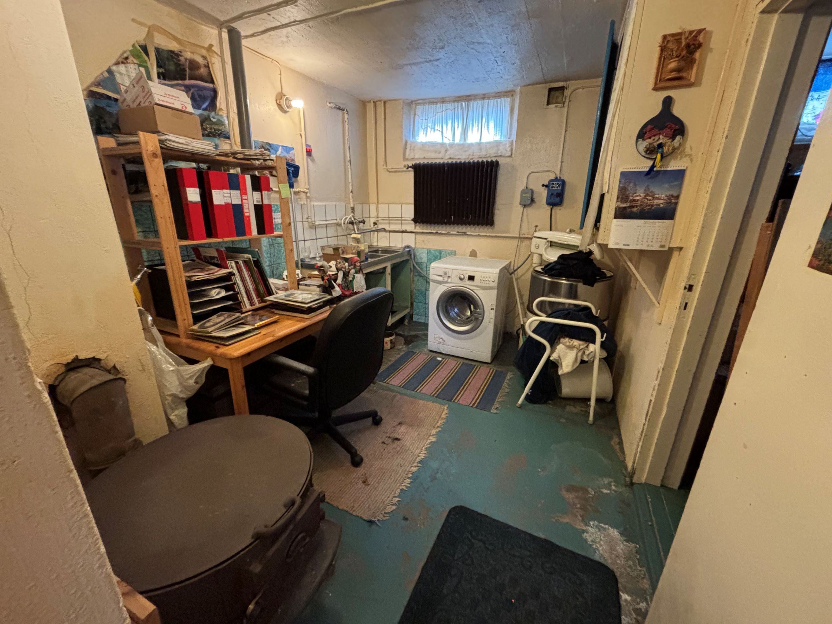 Mindre rum med tvättmaskin