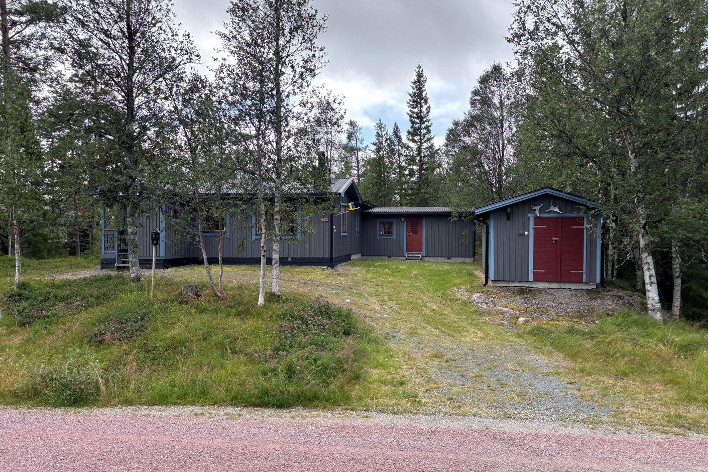 Huset med skotergarage