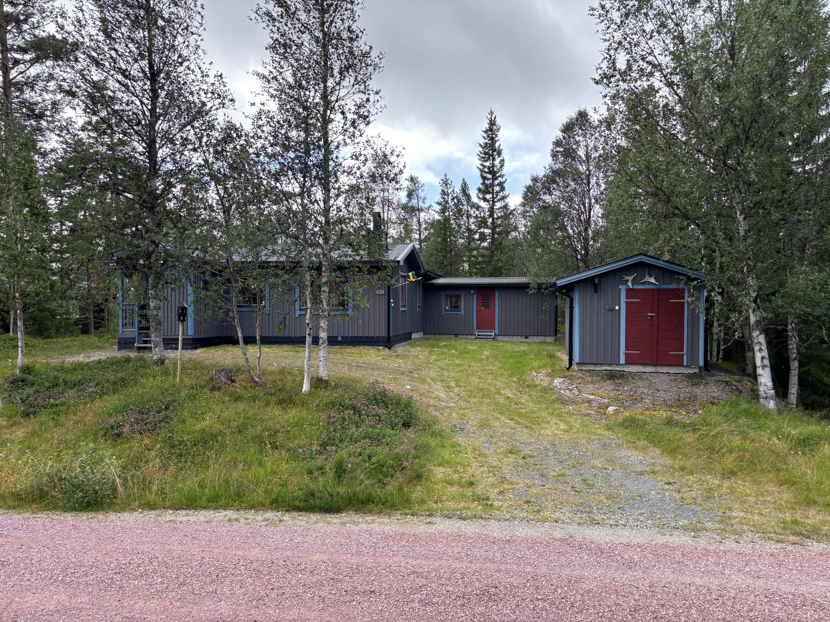 Huset med skotergarage