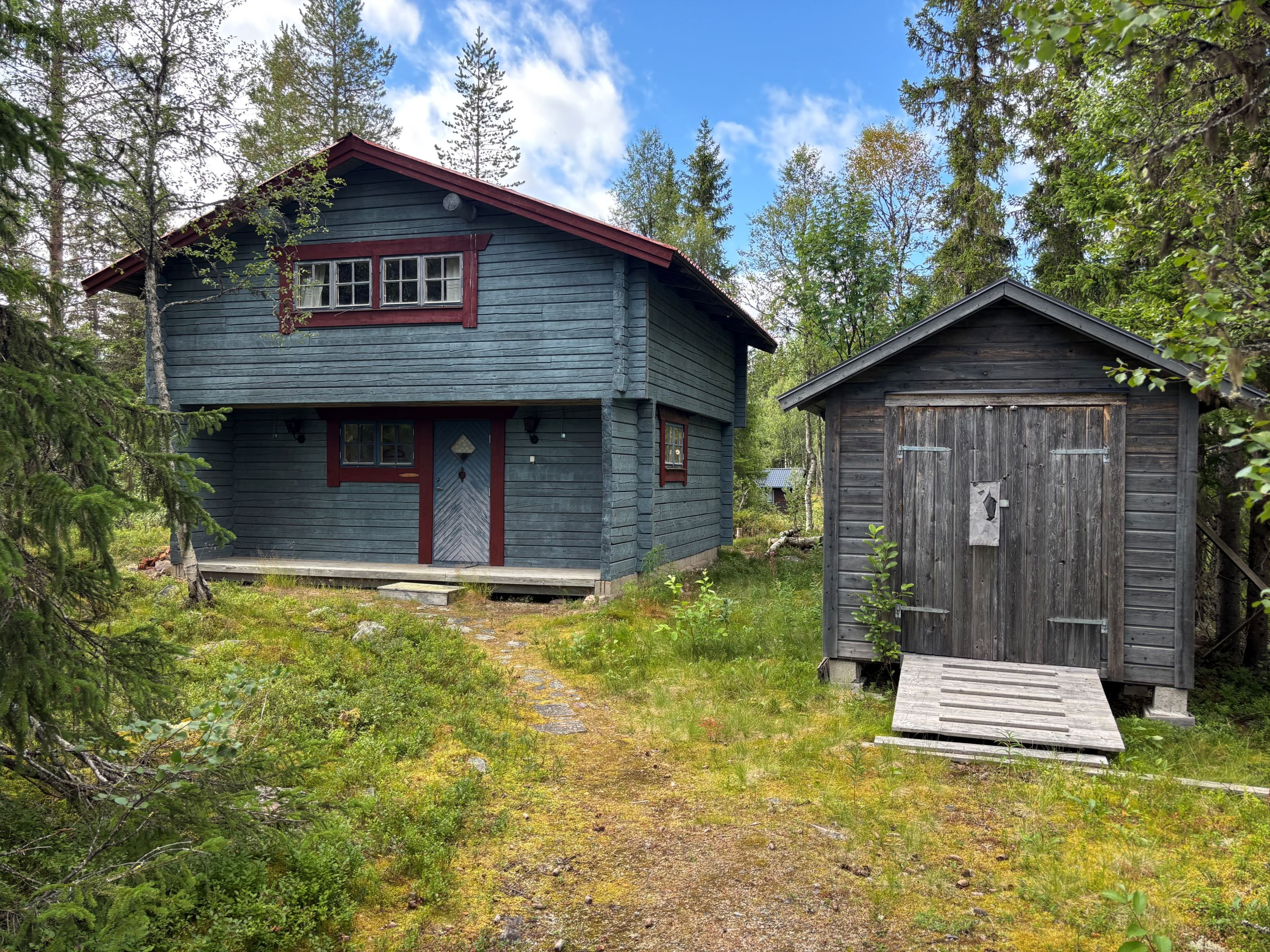 Huset med skotergarage