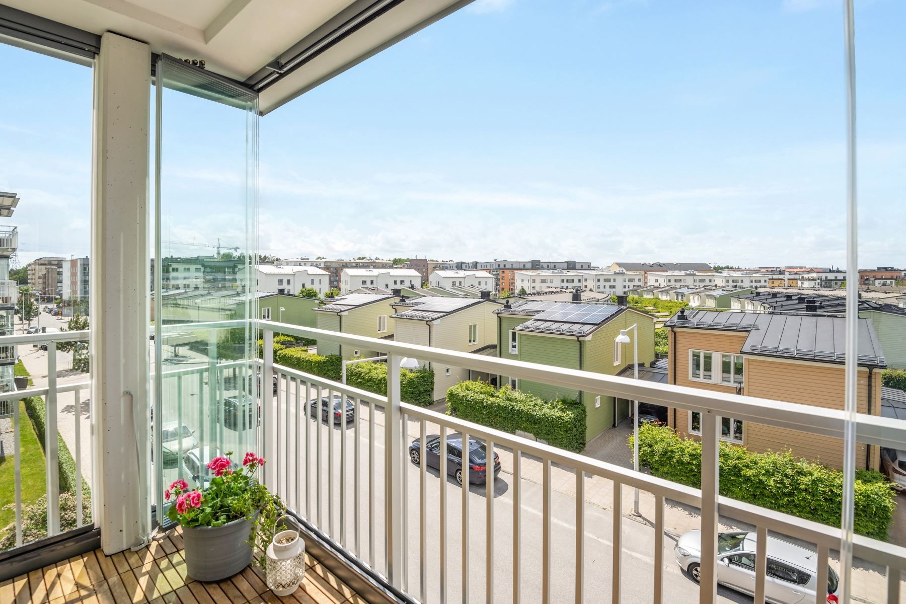 Utsikt över hustaken från balkongen