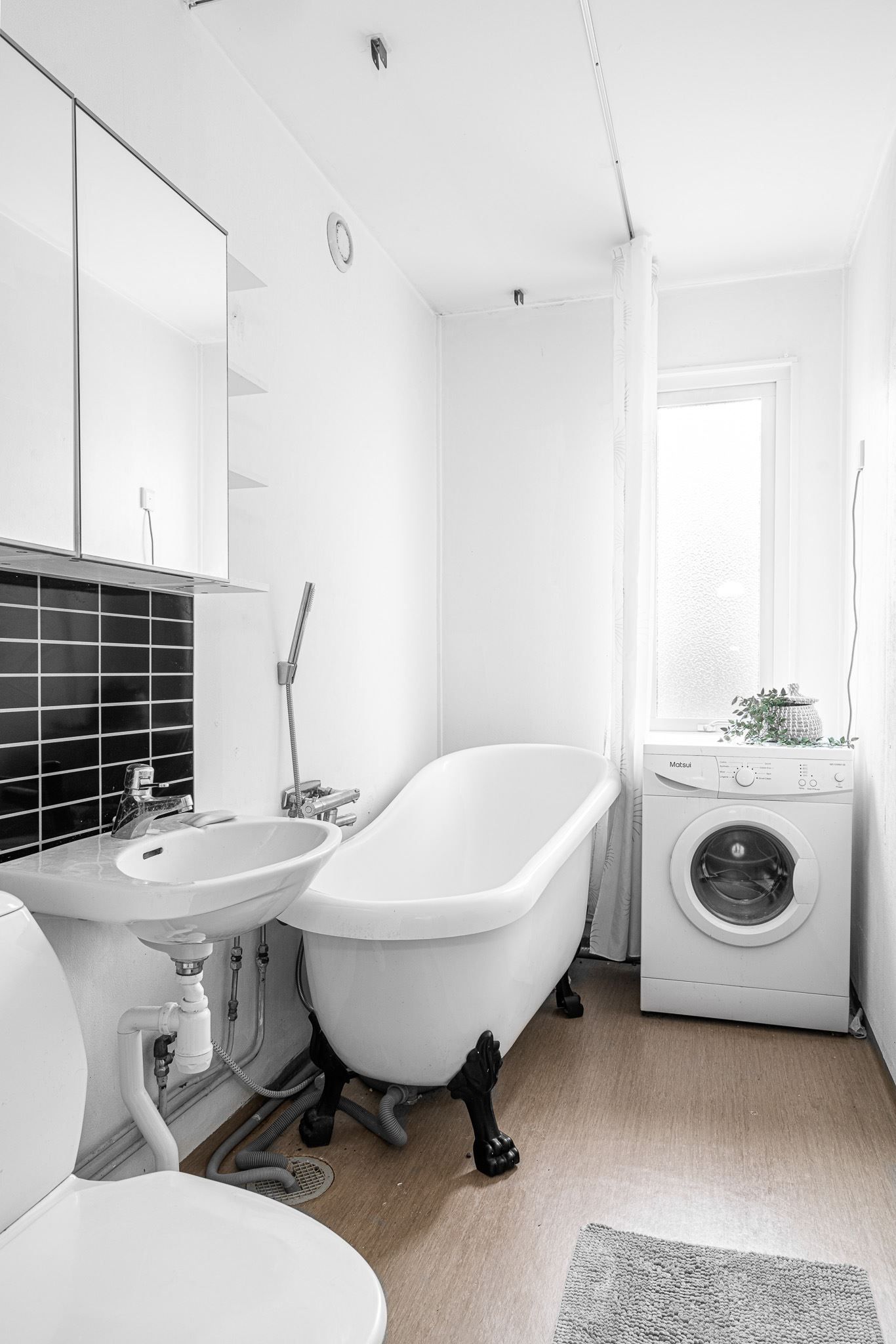 Badrum med egen tvättmaskin