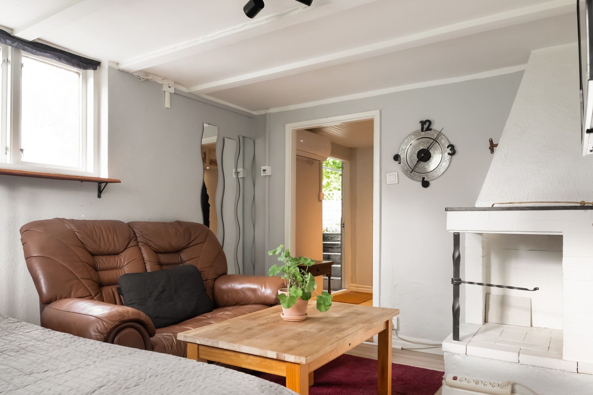 Vardagsrumsdel i lägenhet.