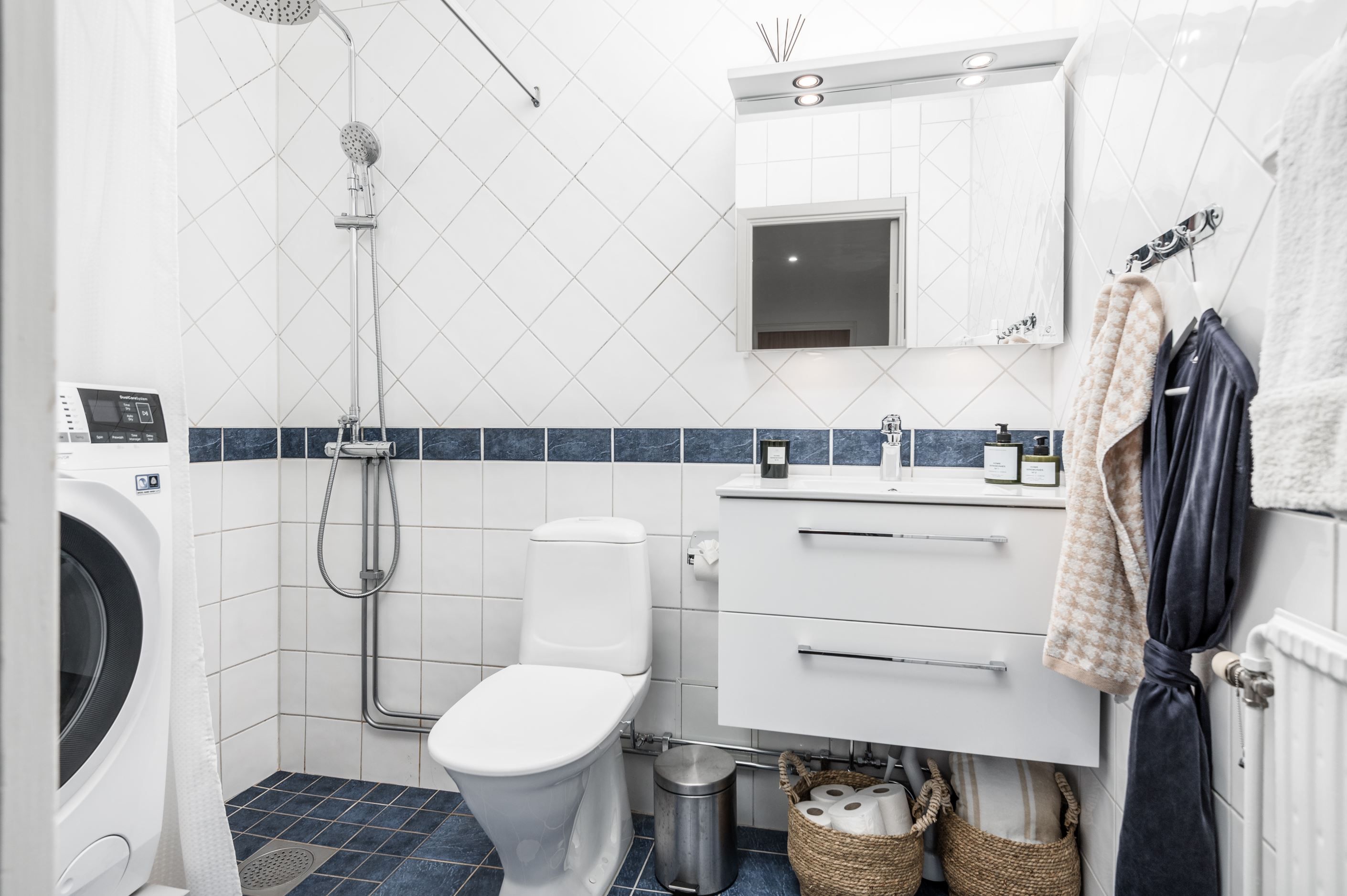 Badrum med egen tvättmaskin