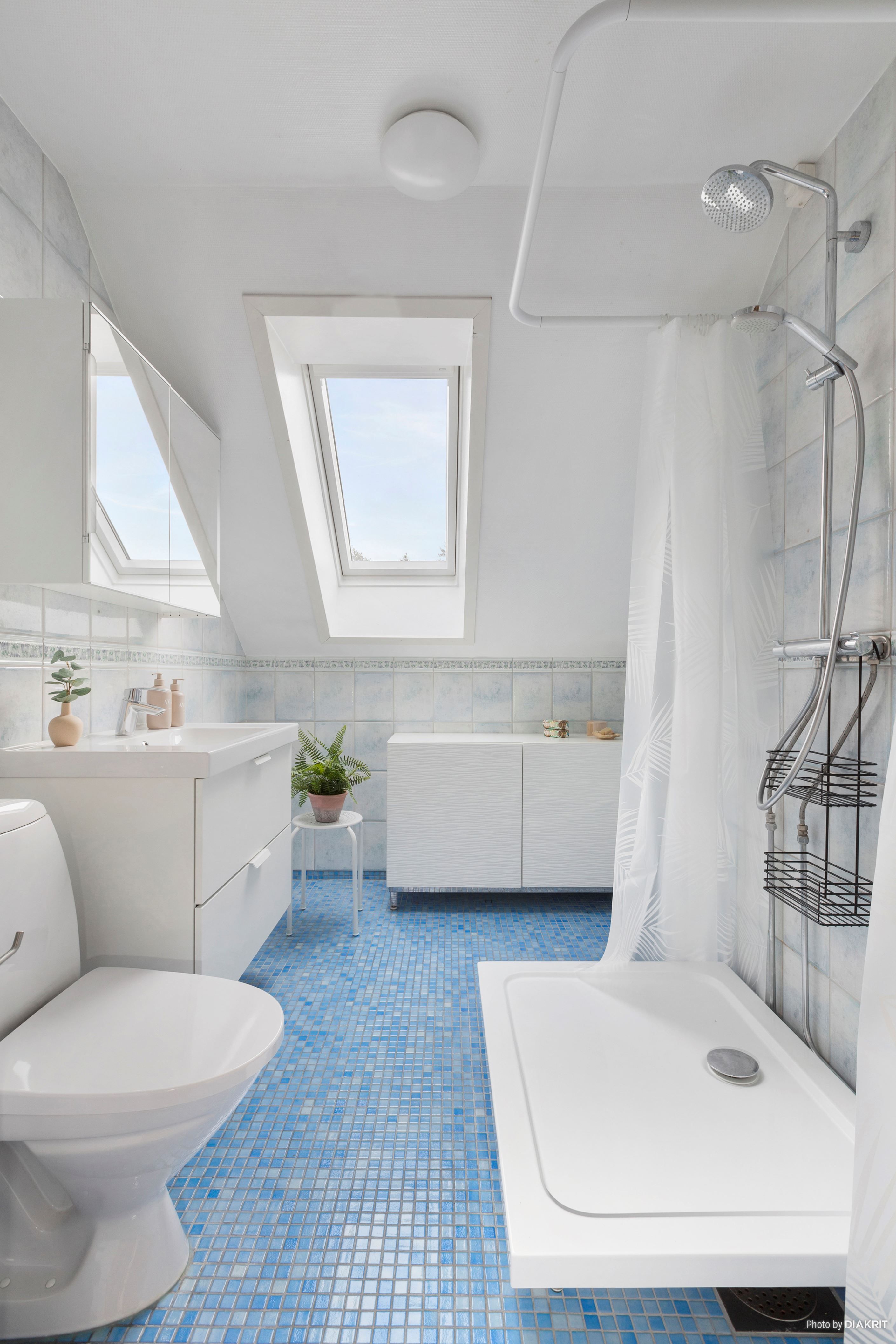 Kaklat WC-/duschrum - övre plan