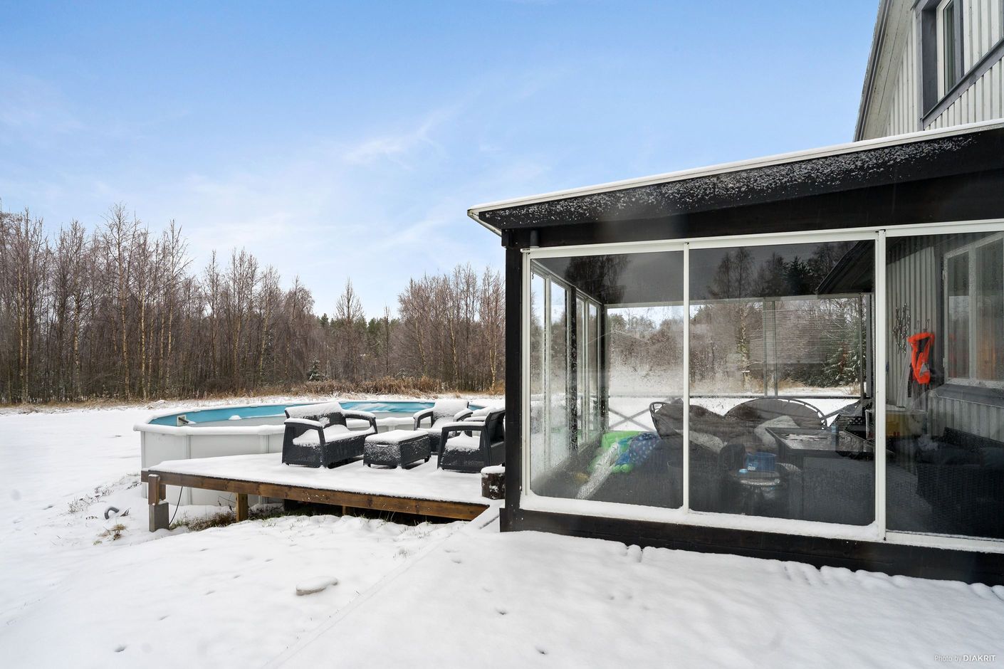 Altan med inglasat uterum