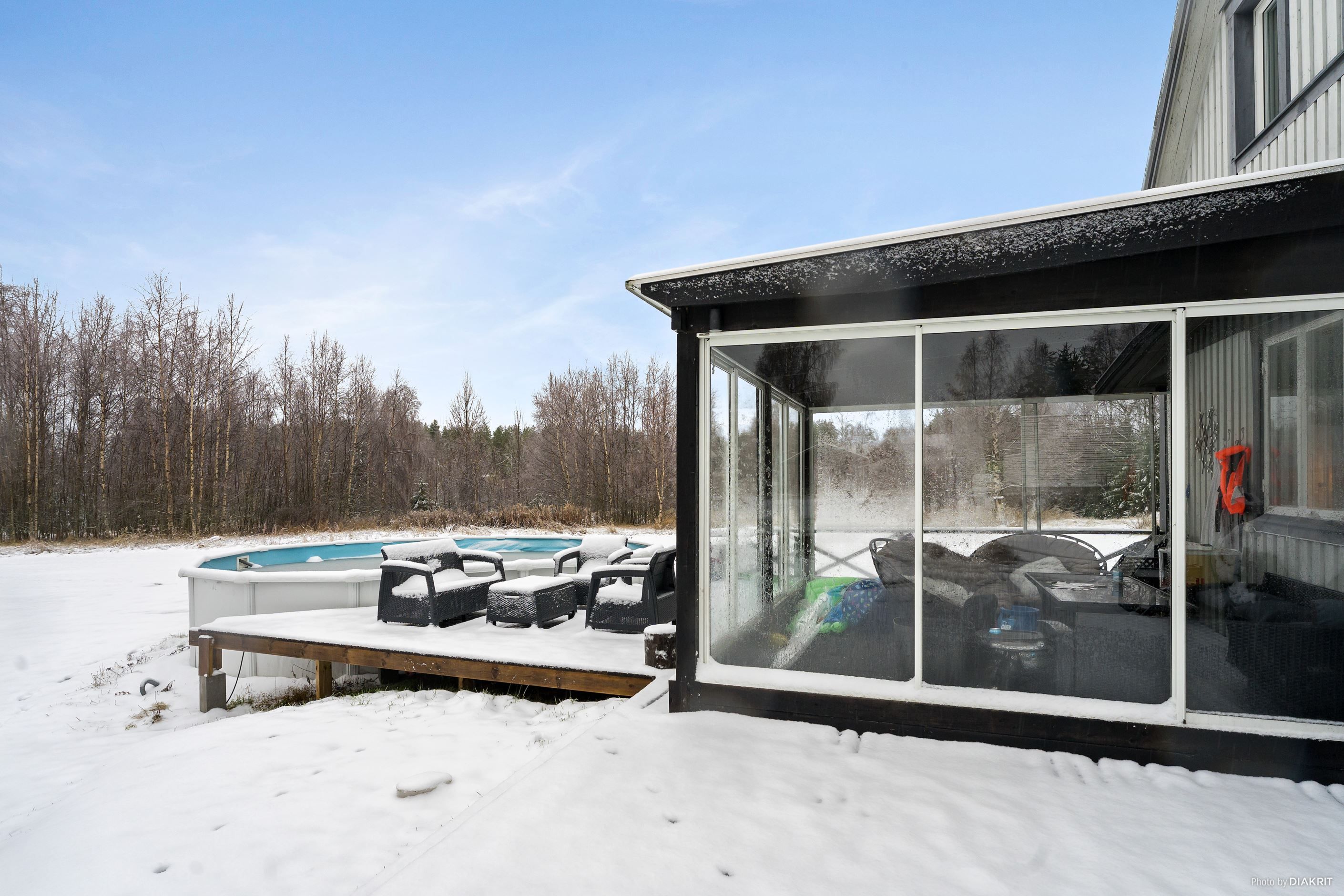 Altan med inglasat uterum