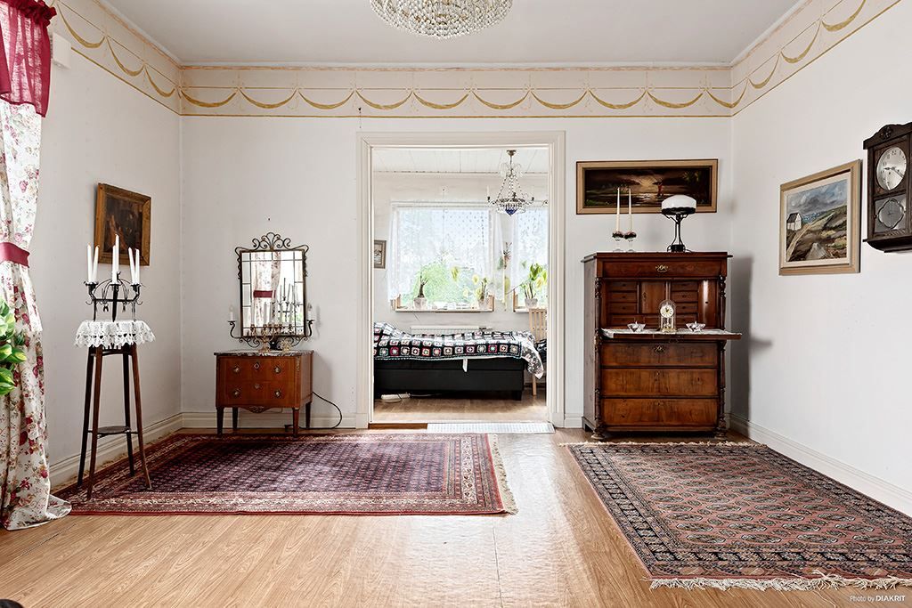 Vardagsrum med en inbyggd veranda